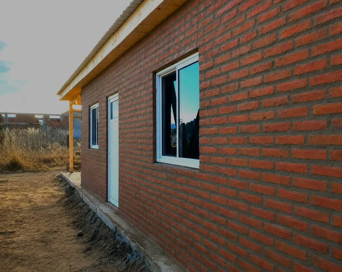 Vivienda en Santa Fe, antes y después del revestimiento
